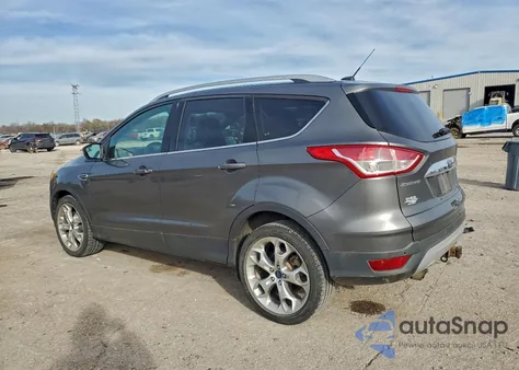 2014 Ford Escape Titanium z USA, uszkodzony, nr VIN 1FMCU0J9XEUB59568